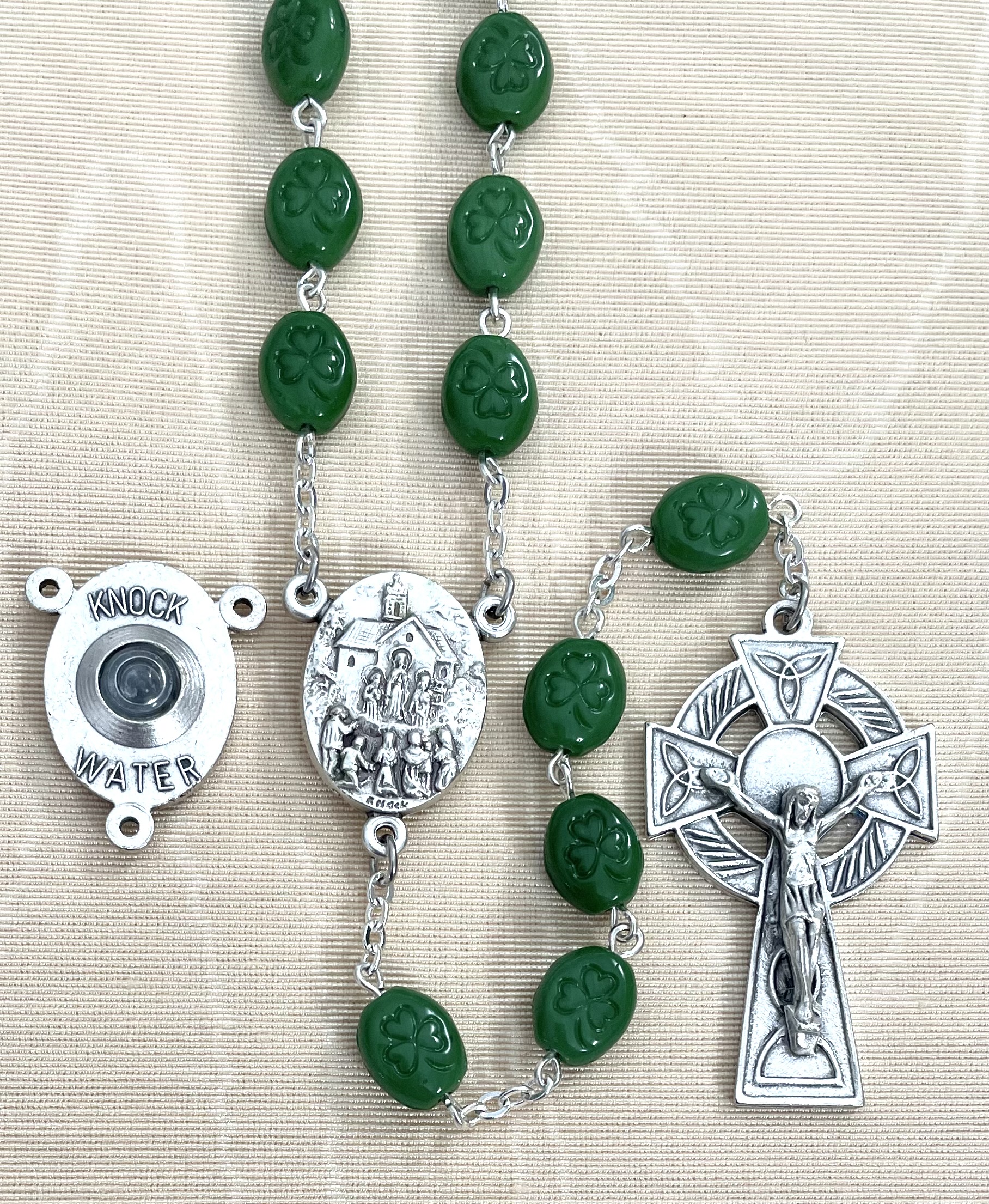 OVAL SHAMROCK ROSARY WITH KNOCK WATER CENTERPIECE. GIFT BOXED