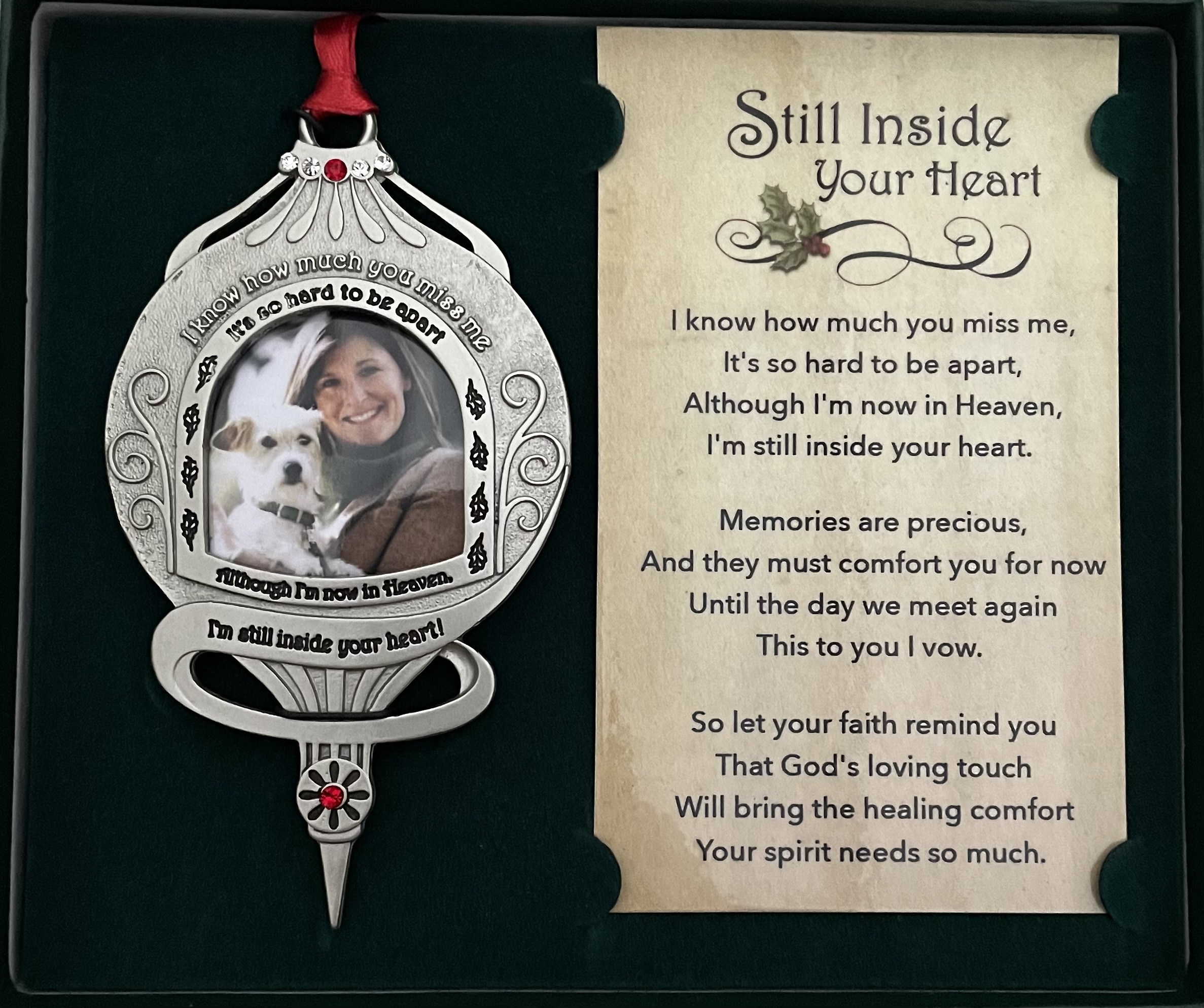 I KNOW HOW MUCH YOU MISS ME PHOTO ORNAMENT. STILL INSIDE YOUR HEART. SILVER ENAMEL METAL ORNAMENT IS ADORNED WITH CRYSTAL AND SIAM STONES ON RED SATIN RIBBON. HOLDS 1.5 IN PHOTO