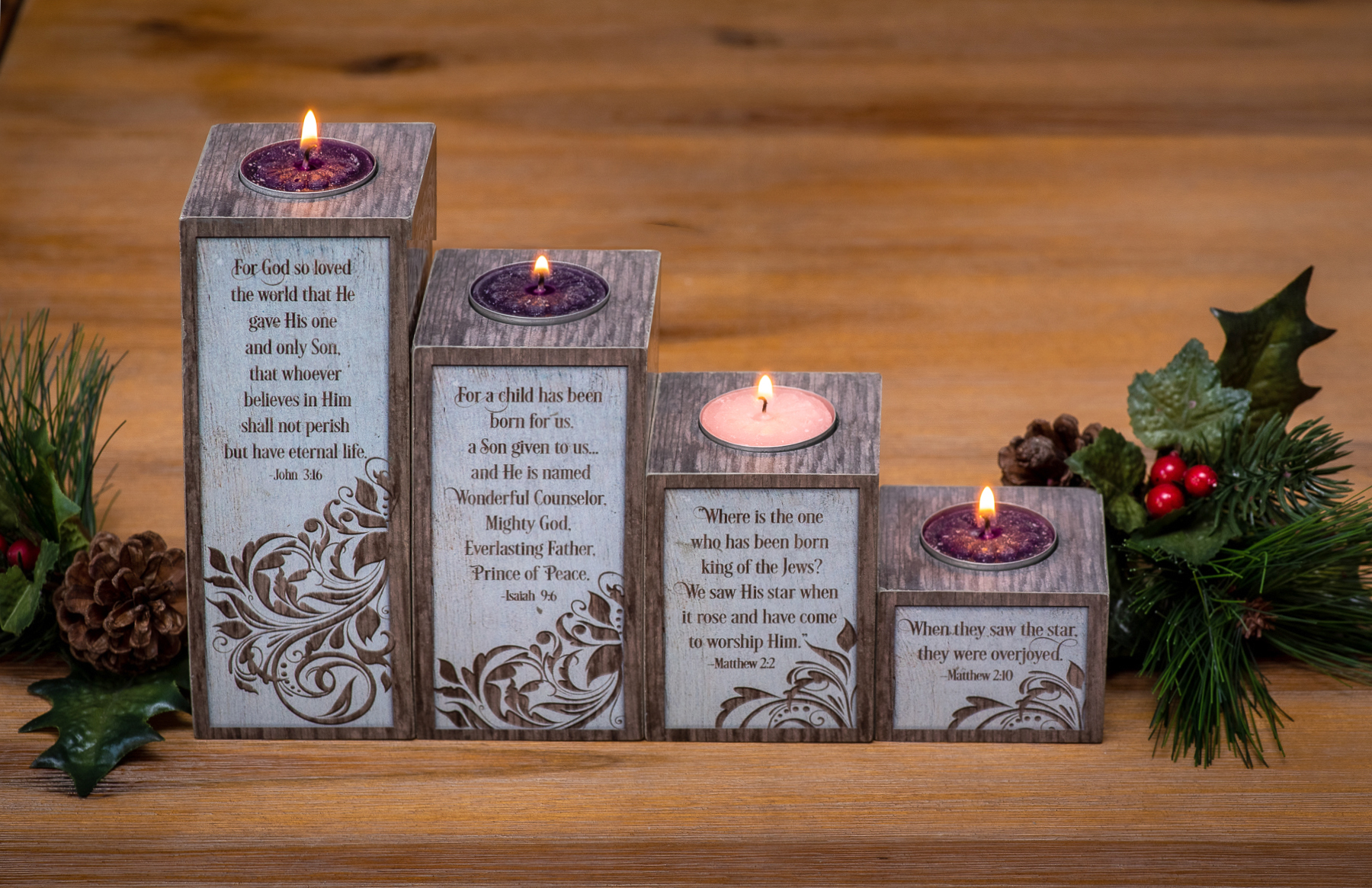 PEACE LOVE HOPE AND JOY ADVENT PILLAR SET. CRAFTED IN WOOD WITH TEXT IN MATTE FINISH ON EACH SIDE. SET IS COMPLETE WITH ADVENT BROCHURE AND 4 ADVENT TEA LIGHTS. PILLARES ARE 2.5 IN SQUARE AND RANGE IN HEIGHT FROM 2 IN H TO 6.5 IN H. BOXED