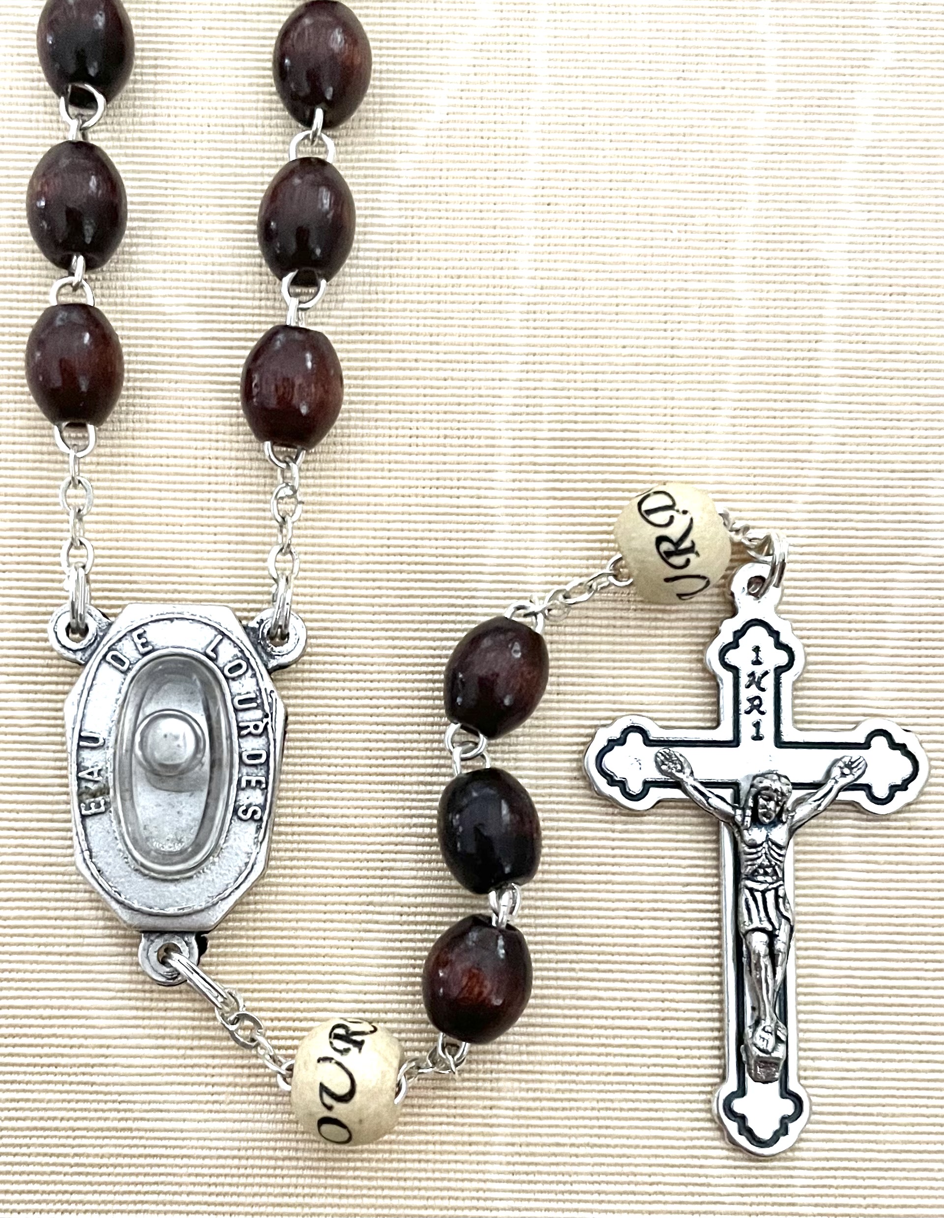 OVAL MARRONE WOOD ROSARY WITH LOURDES WATER CENTER AND OF BEADS