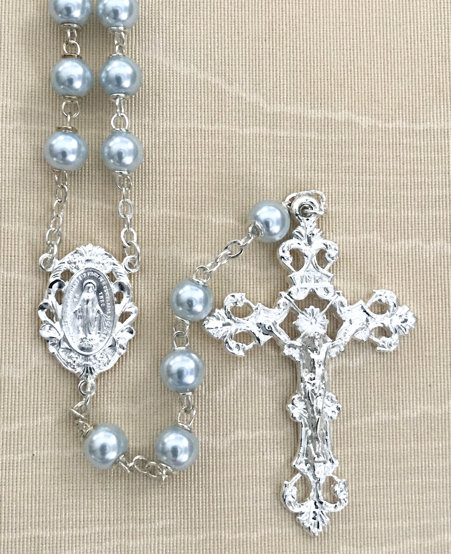7mm ROUND LIGHT BLUE PEARL ROSARY WITH STERLING SILVER PLATED CRUCIFIX AND CENTER GIFT BOXED