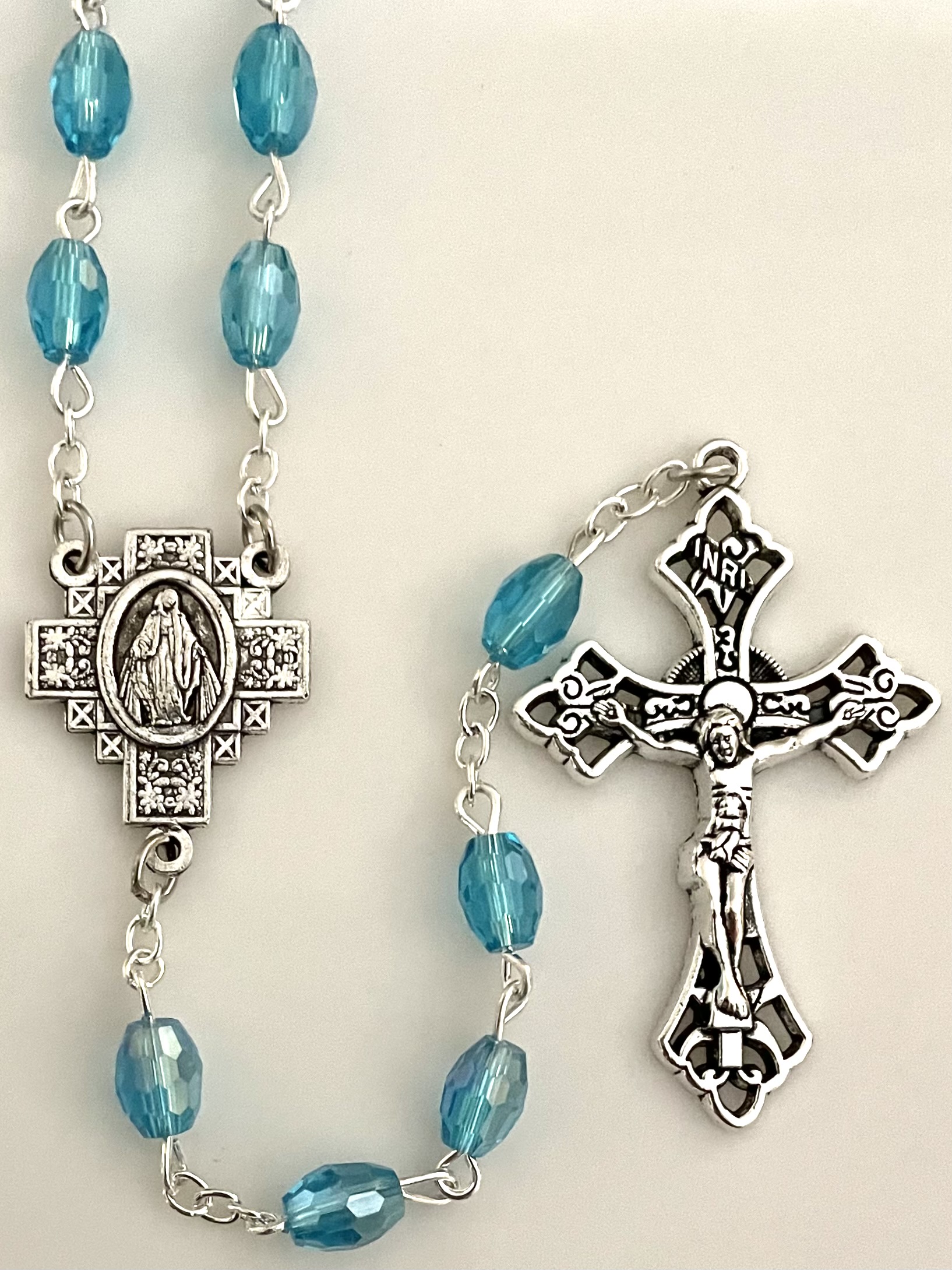 7x5mm TIN CUT AQUA ROSARY WITH SILVER OXIDIZED CRUCIFIX AND CENTER GIFT BOXED 