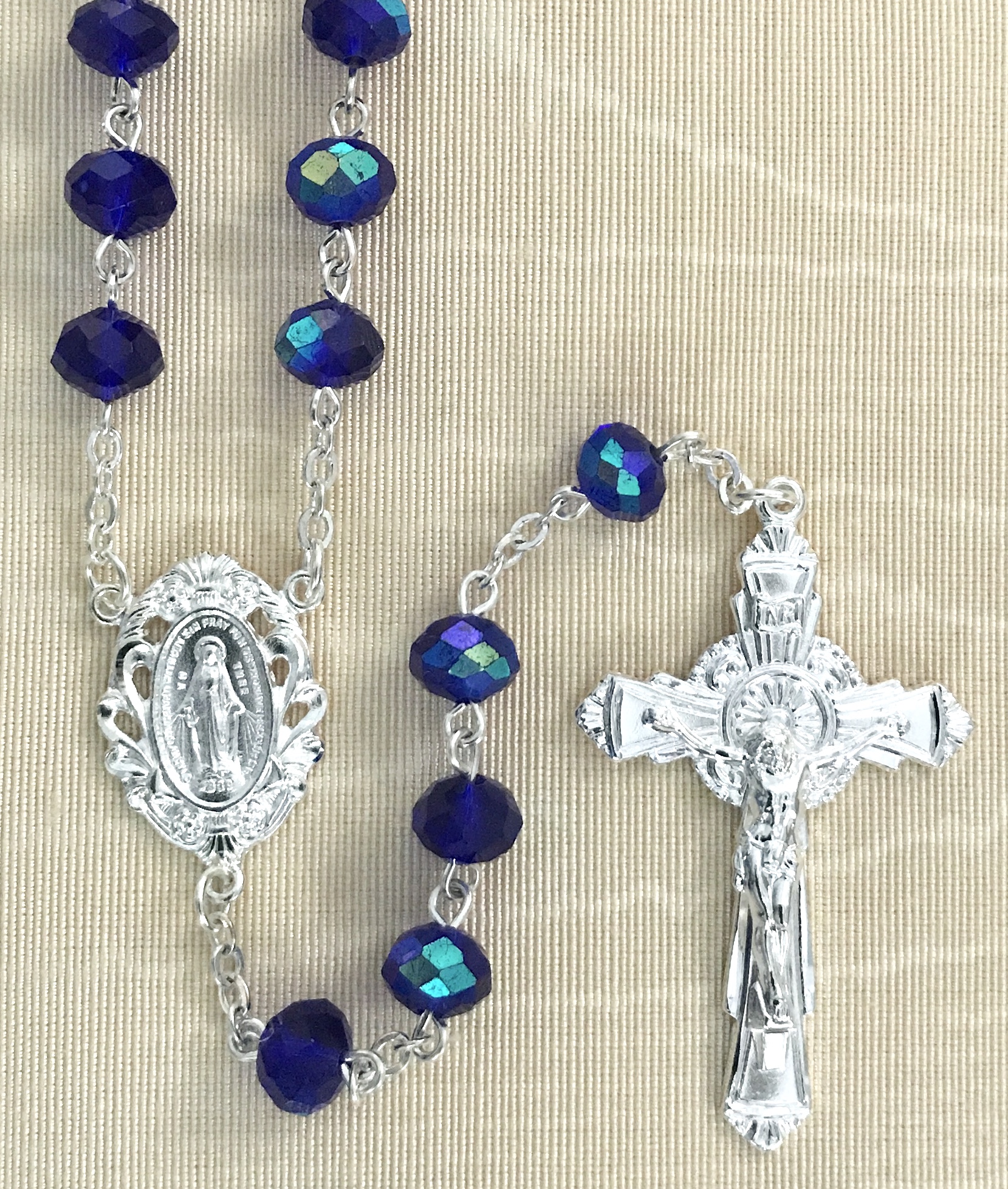 8X6 TIN CUT AB DARK BLUE ROSARY WITH STERLING SILVER PLATED CRUCIFIX AND CENTER GIFT BOXED