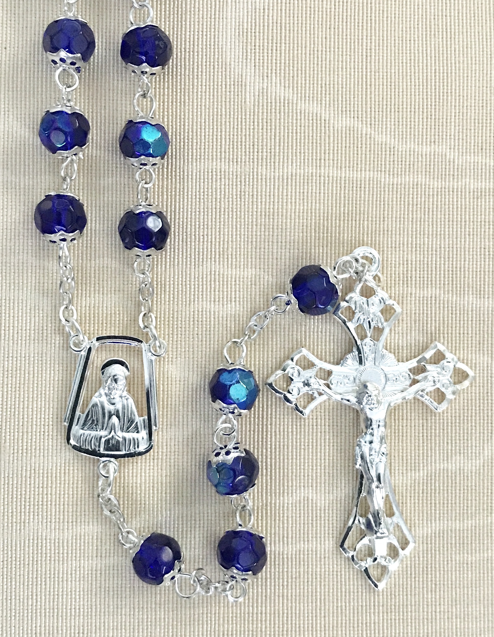 7mm BLUE GLASS AB DOUBLE CAPPED ROSARY WITH STERLING SILVER PLATED CRUCIFIX AND CENTER GIFT BOXED