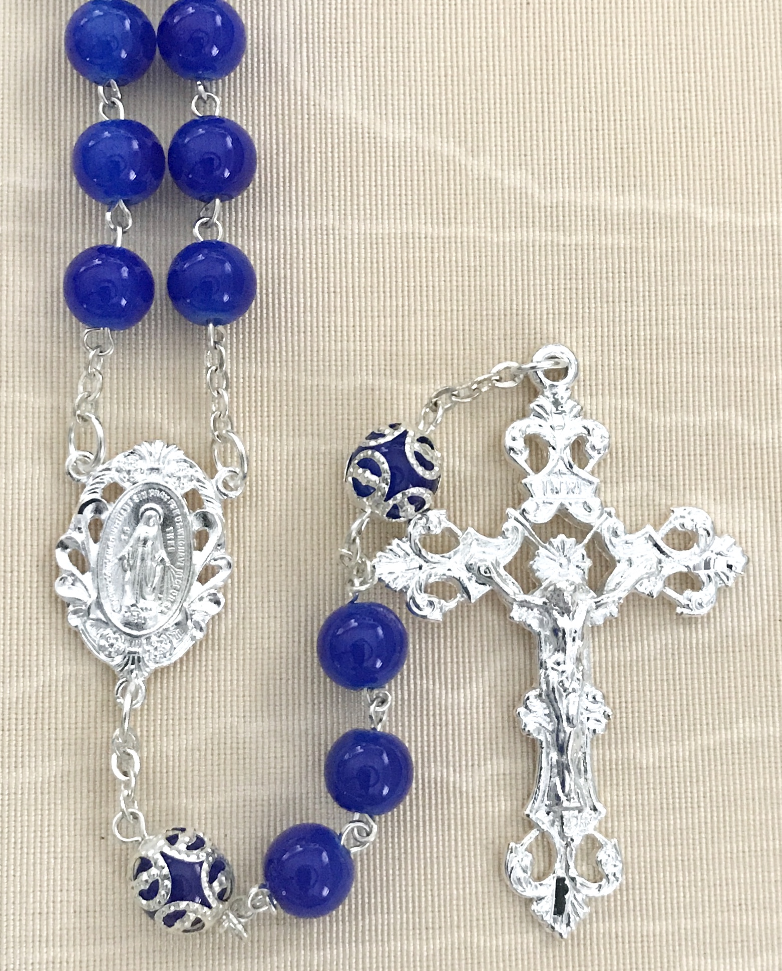 8mm DARK SAPPHIRE GLASS ROSARY WITH CAPPED OUR FATHER BEADS AND STERLING SILVER PLATED CRUCIFIX AND CENTER GIFT BOXED