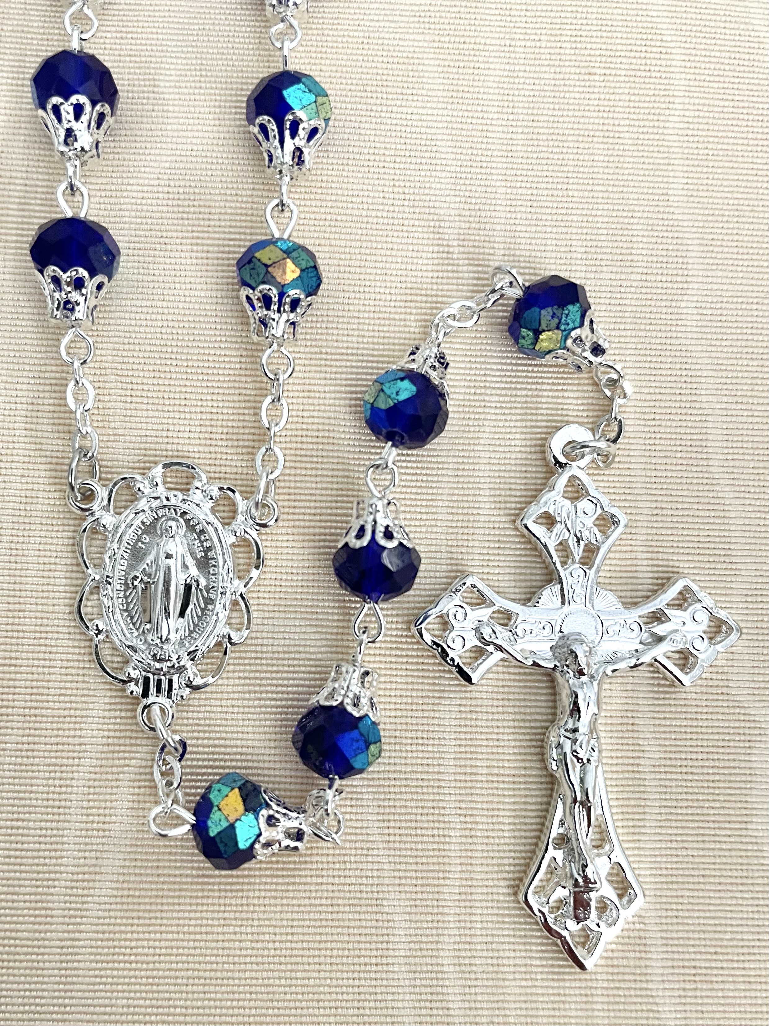 8X6 TIN CUT CAPPED AB DARK SAPPHIRE ROSARY WITH STERLING SILVER PLATED CRUCIFIX AND CENTER, GIFT BOXED
