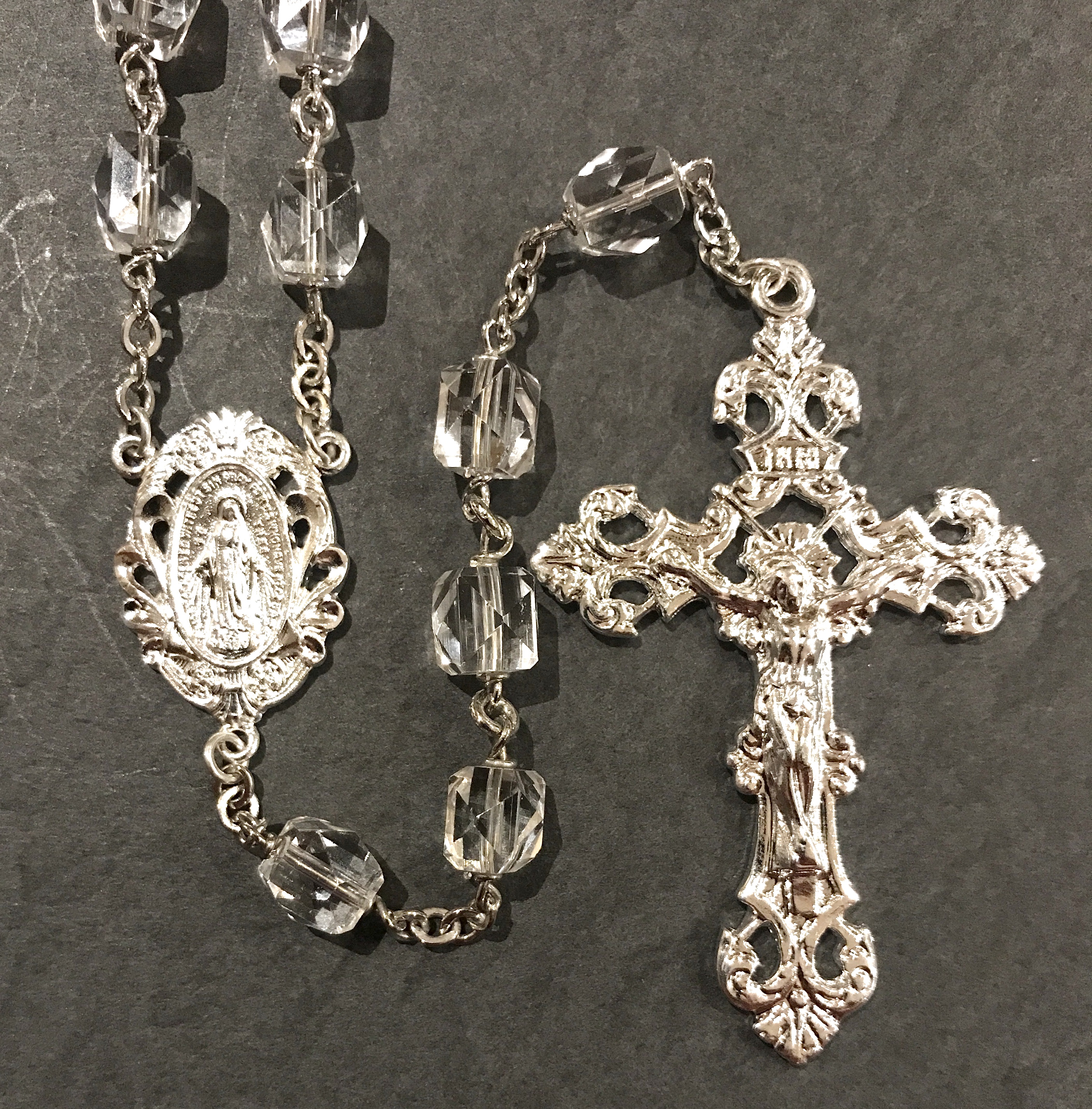 7mm MULTI FACETED ROCK CRYSTAL BEAD ROSARY WITH HAND TWISTED CONSTRUCTION AND STERLING SILVER PLATED CRUCIFIX, CENTER, WIRE, CHAIN GIFT BOXED