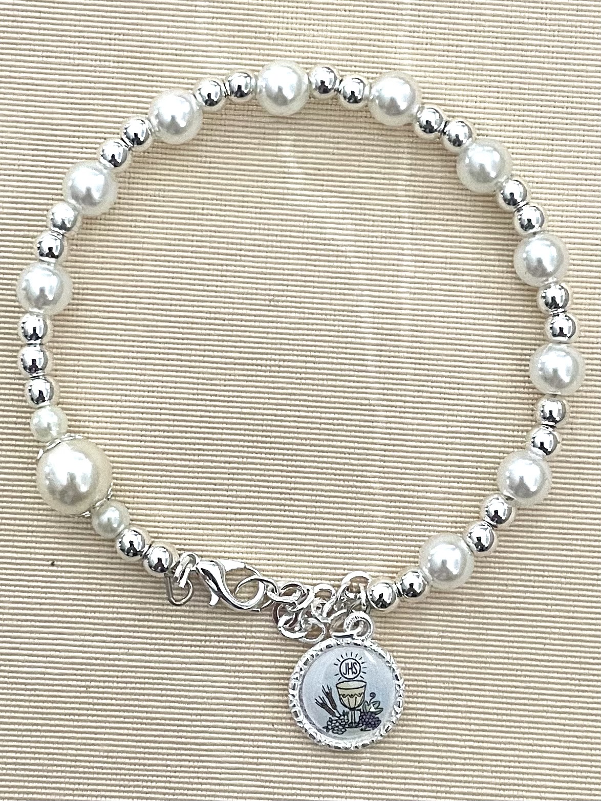 Pearl First Communion Bracelet with FC Charm. Adjustable