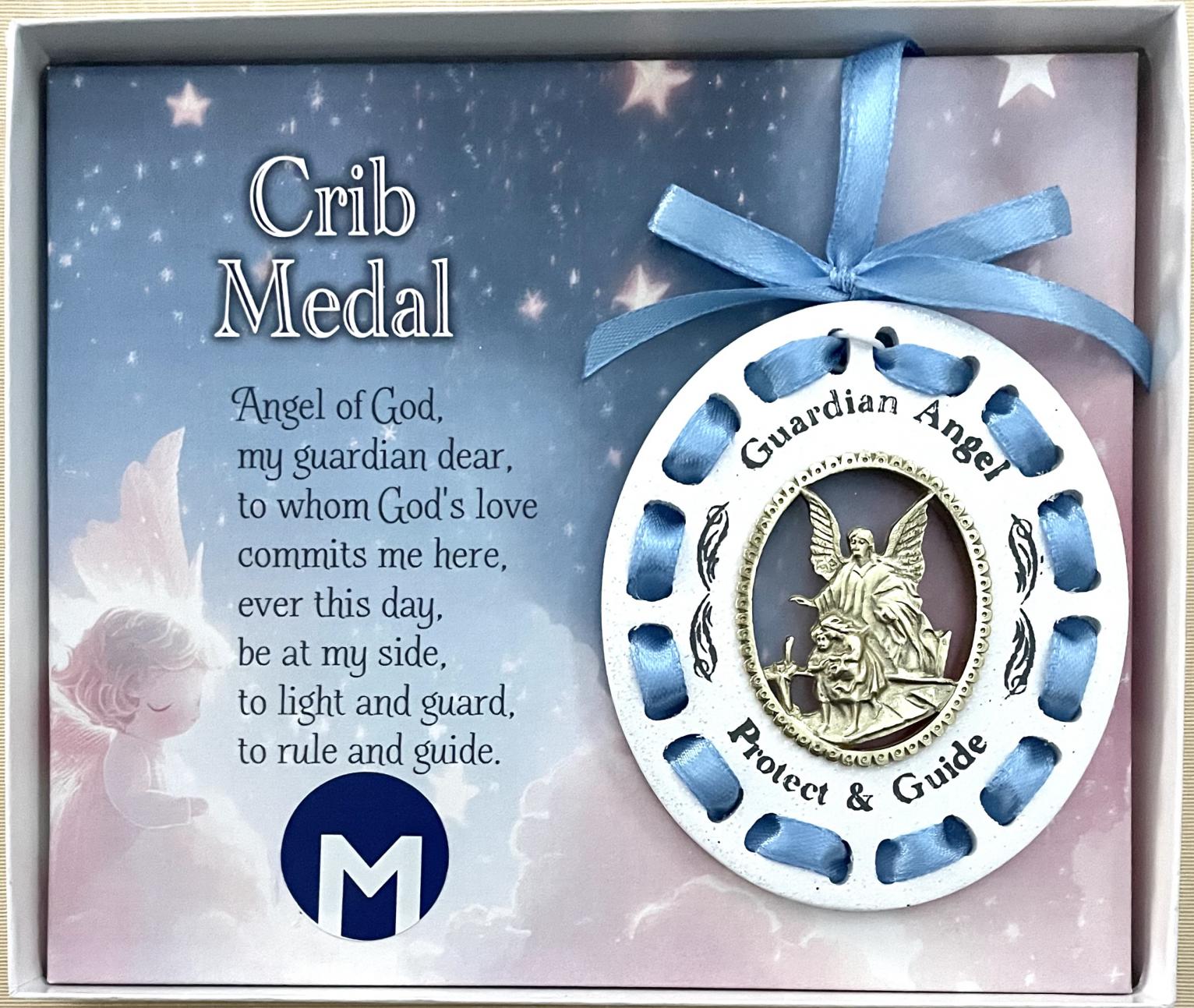 Crib Medal with Blue Ribbon woven through White Sparkled Wood with cut out oval with antique gold finish cast metal sculpted angel 3.5 in H x 3in W. Window box 