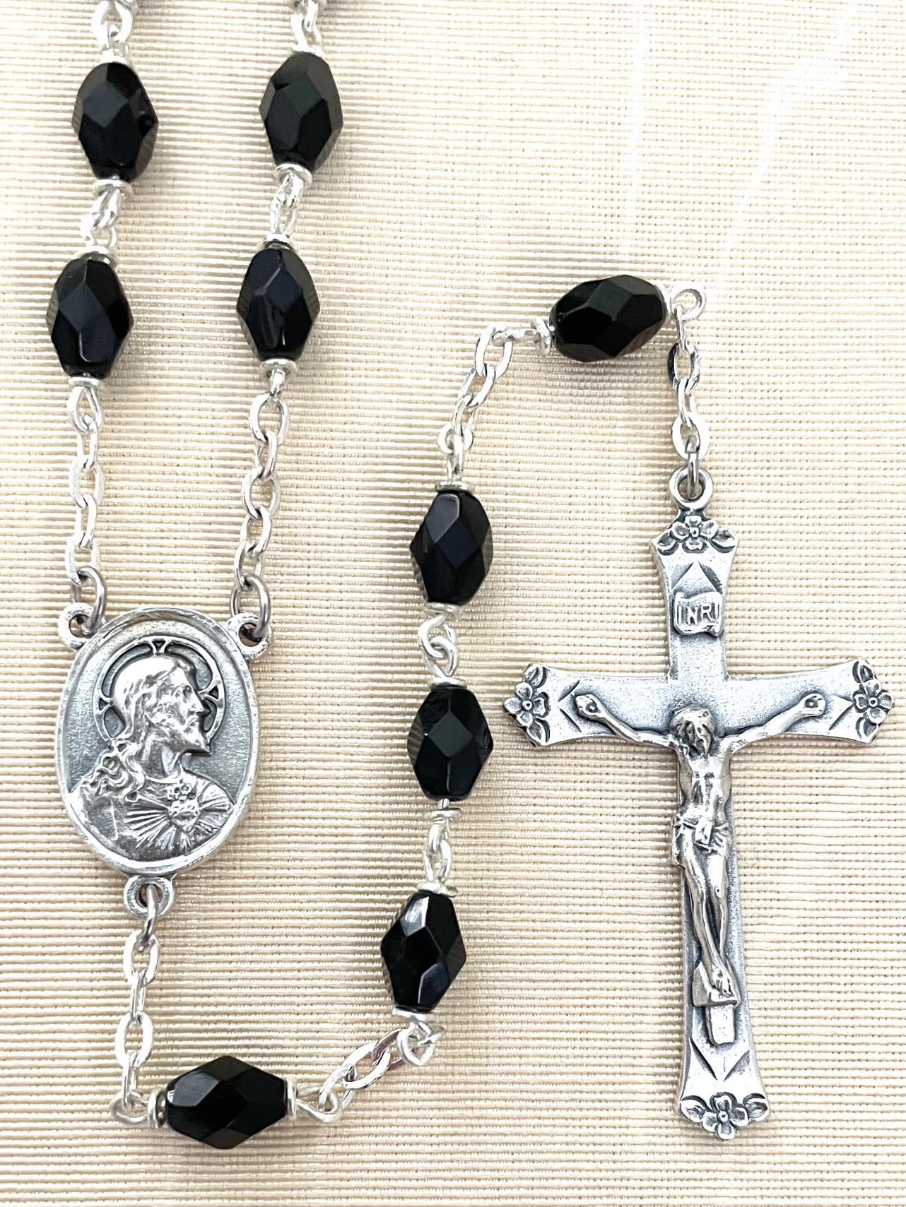 6X8MM BLACK FACETTED TIN CUT LOC LINK ROSARY WITH ROMAGNA CRUCIFIX AND CENTER. GIFT BOXED