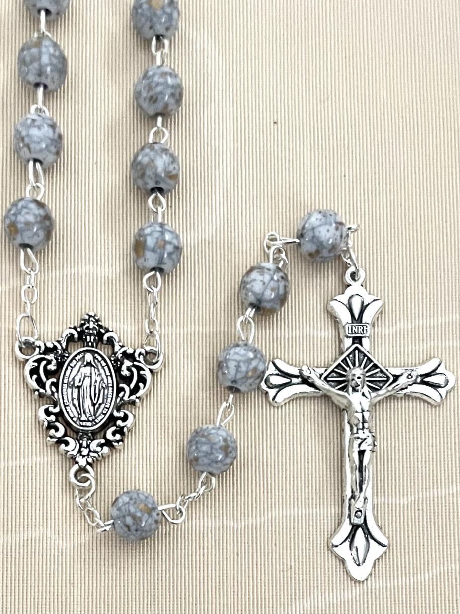 8MM WHITE SPECKLED ROSARY WITH SILVER OXIDIZED CRUCIFIX AND CENTERPIECE.