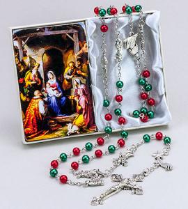 CHRISTMAS ROSARY MADE WITH 6MM EMERALD AND RUBY PEARL BEADS. THE OUR FATHER BEADS ARE CAST METAL SILVER OXIDIZED MEDALS DEPICTING THE FIGURES FROM THE NATIVITY. GIFT BOXED WITH PRAYER CARD