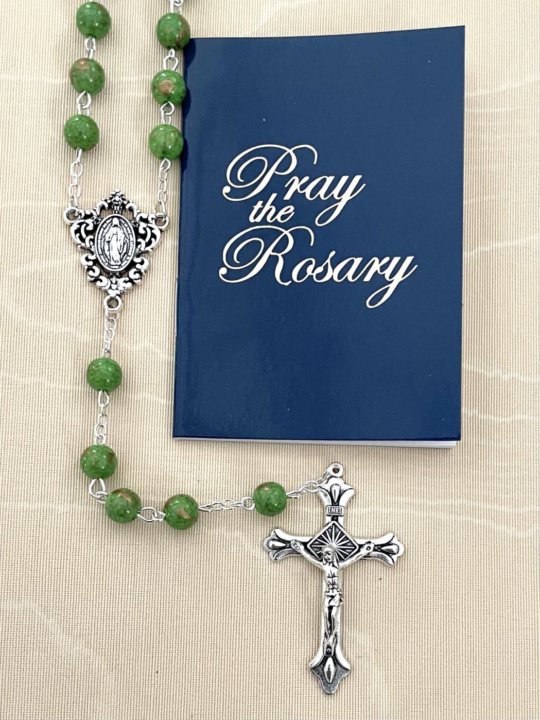 8MM EMERALD GOLD SPECKLED ROSARY WITH HOW TO SAY THE ROSARY BOOKLET. PACKAGED IN HANGING BAG FOR DISPLAY PURPOSES